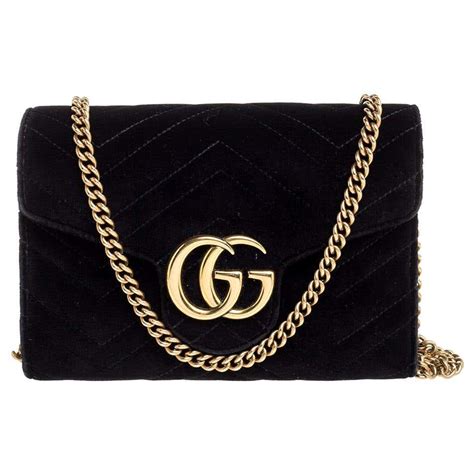 gucci marmont chevron chain wallet|Gucci interlocking wallet on chain.